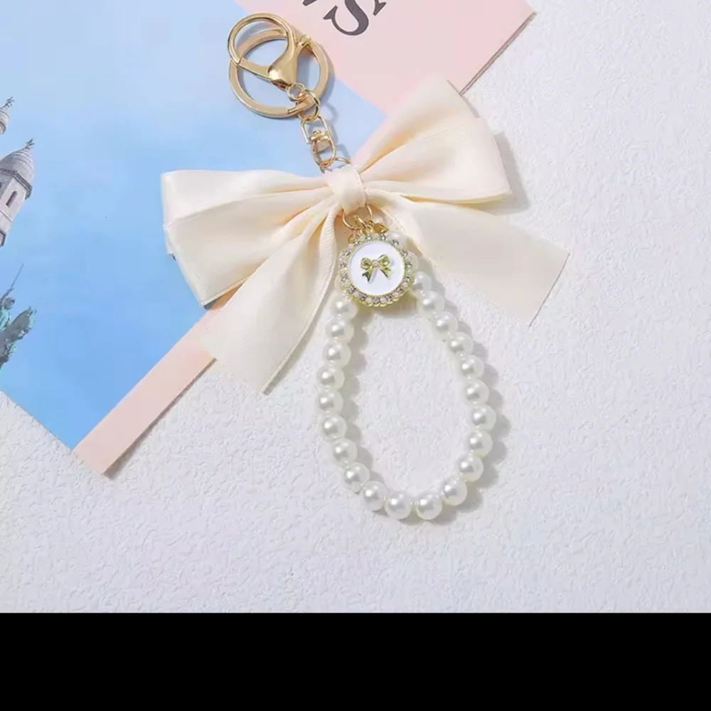 Elegant White Bow Phone Case with Pearl Chain